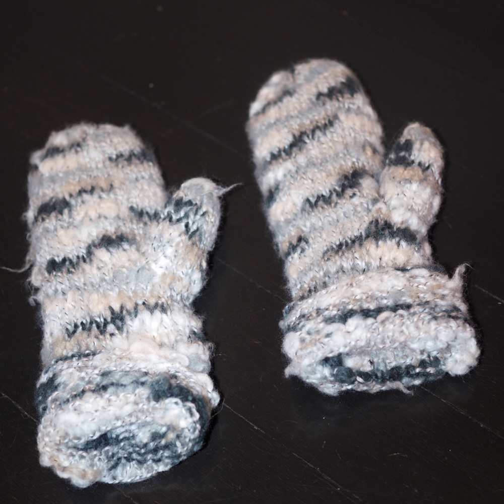 Fleece-lined, fuzzy knit mittens.